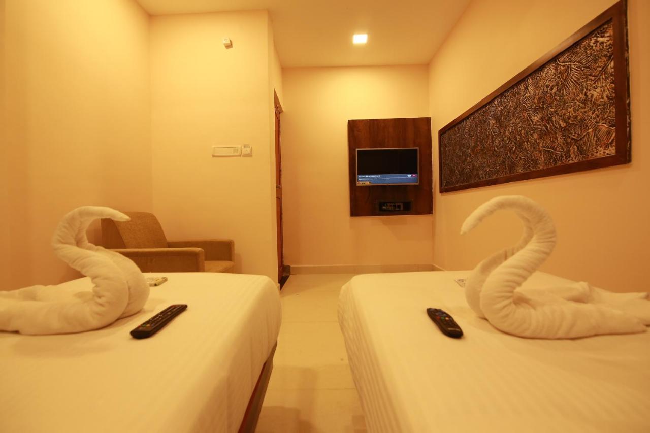 Hotel Apple Suites Bangalore Esterno foto