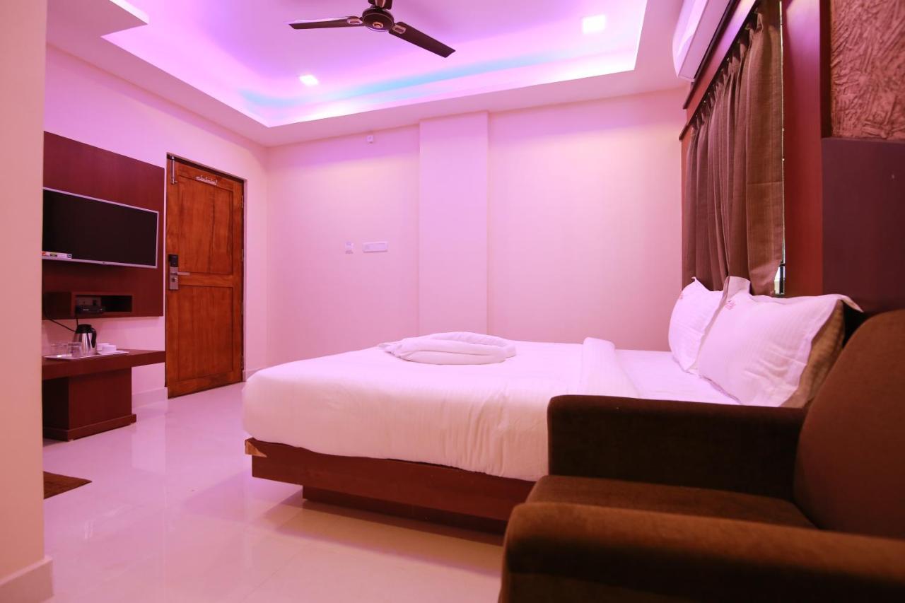 Hotel Apple Suites Bangalore Esterno foto