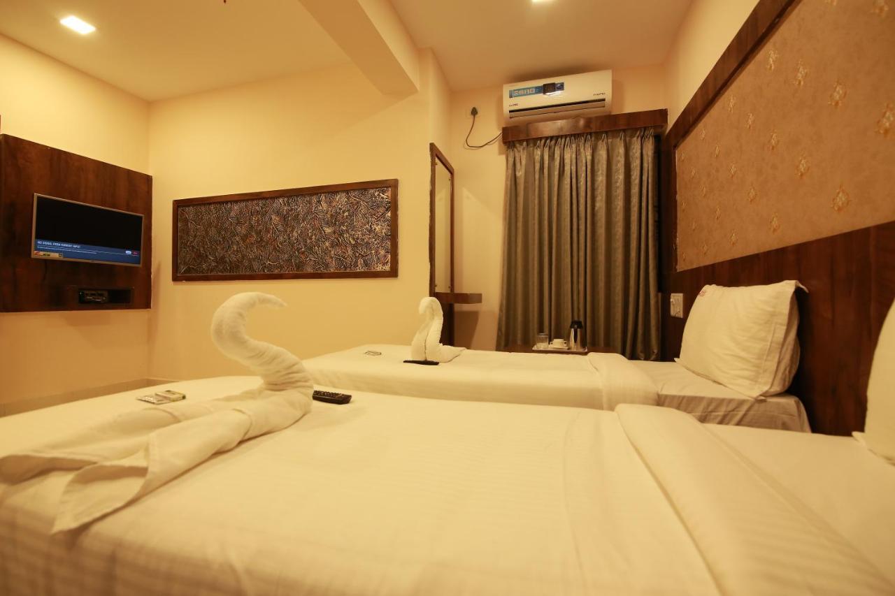 Hotel Apple Suites Bangalore Esterno foto