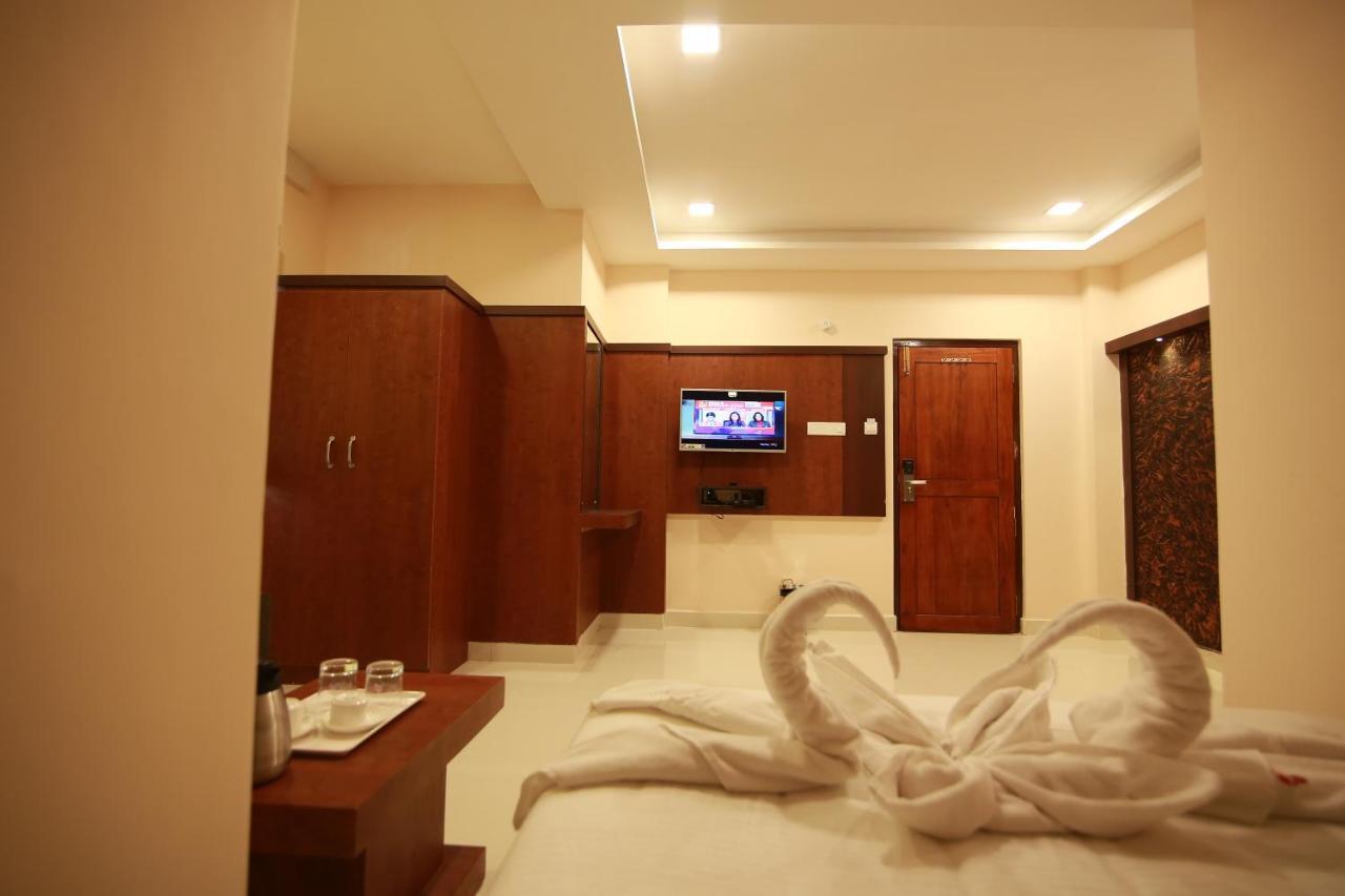Hotel Apple Suites Bangalore Esterno foto