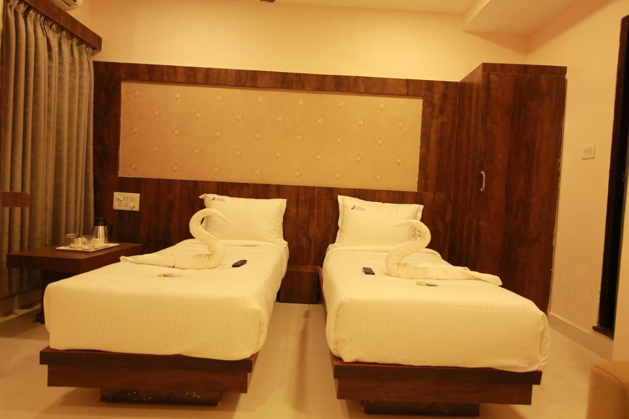 Hotel Apple Suites Bangalore Esterno foto