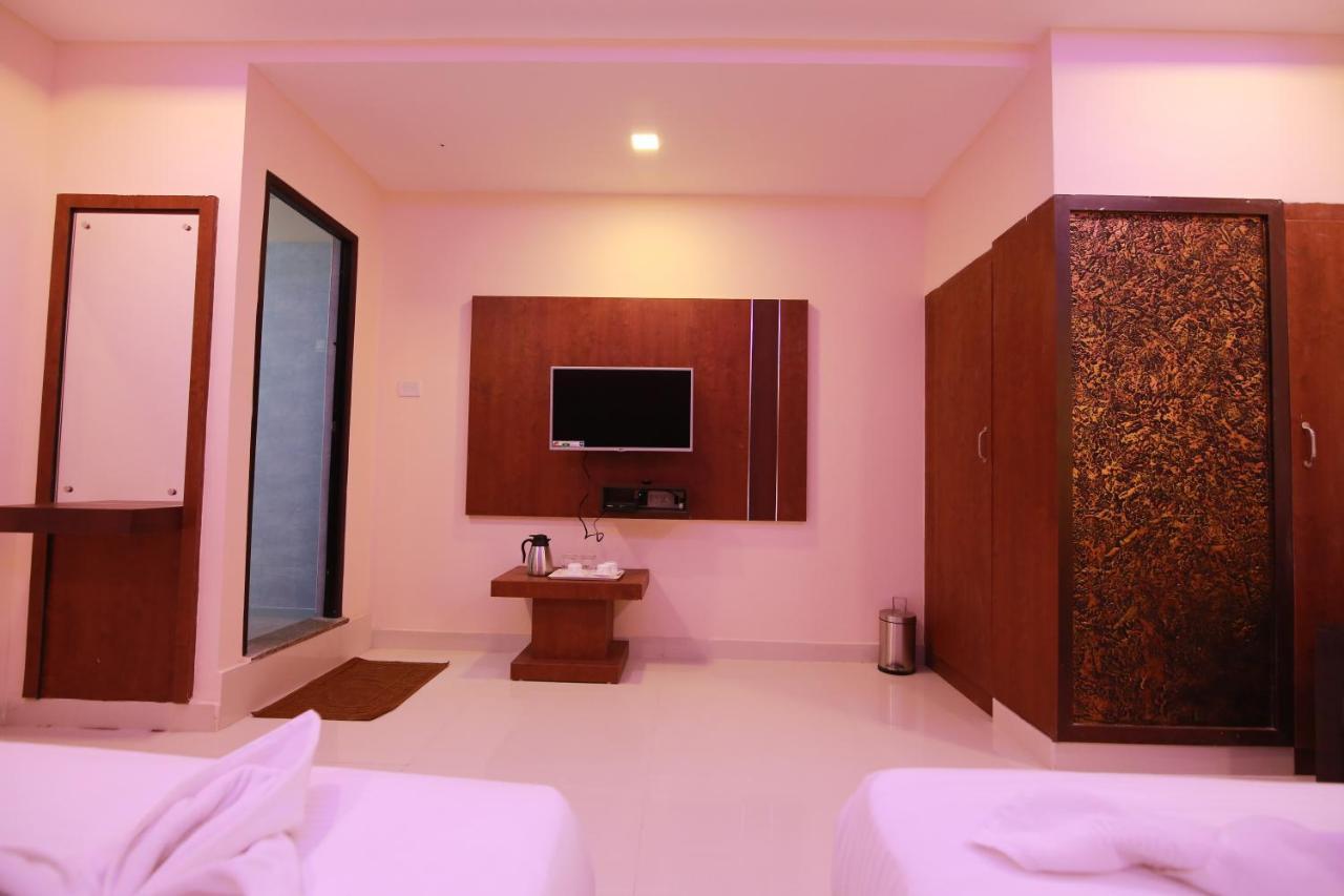 Hotel Apple Suites Bangalore Esterno foto