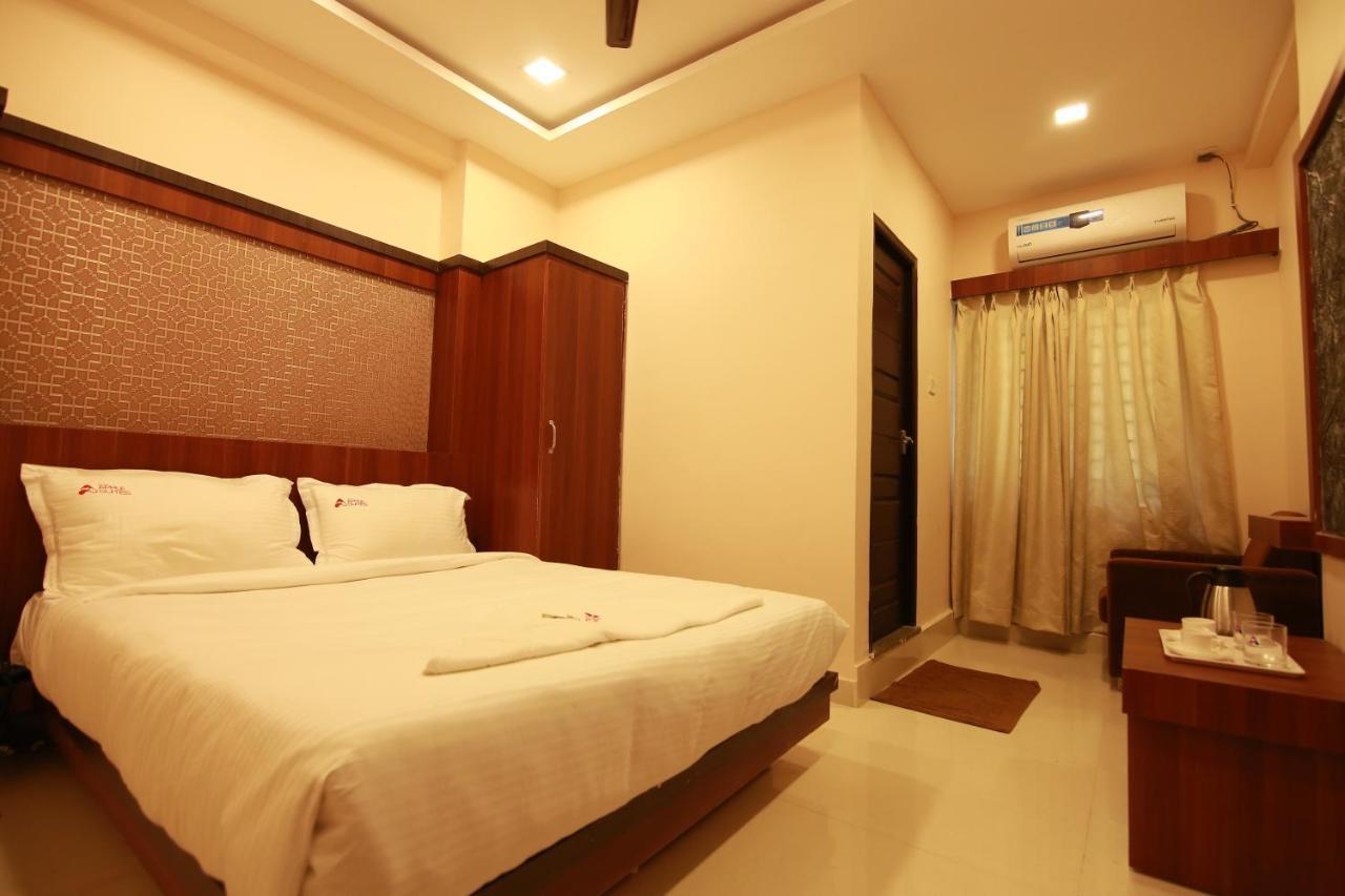 Hotel Apple Suites Bangalore Esterno foto